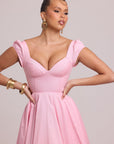 Roselle dress featuring adjustable lace-up back and pockets