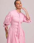 pink cotton dress with lace-up back and curved waist cut-out