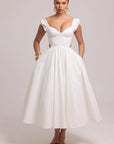 White cotton dress with structured bodice and full skirt