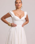 White full skirt dress with added volume from tulle under-layer