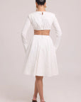 Long-sleeve crop top with contoured seams and matching full skirt