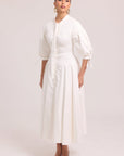 White cotton dress with structured bodice and full skirt