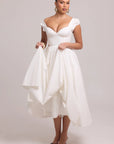Lightweight white cotton dress with soft movement