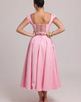 Cotton dress with fitted bodice, voluminous skirt, and hidden tulle layer