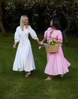 Cotton dress with fitted bodice, voluminous skirt, and hidden tulle layer