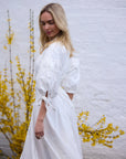 Lightweight white cotton dress with soft movement